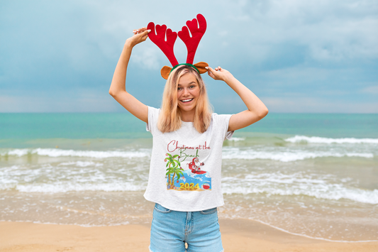 Christmas at the Beach Tee, Unisex Heavy Cotton Shirt, Summer Holiday T-Shirt, Santa Surfing Tee, Beach Vacation Top, Festive Casual Wear